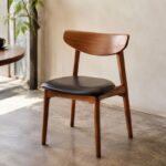 Custom cafe furniture with wooden chair and black upholstered seat
