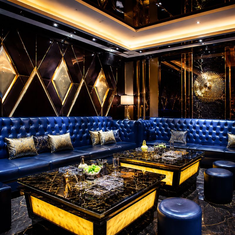 Blue Chesterfield nightclub booth sofa with LED marble table