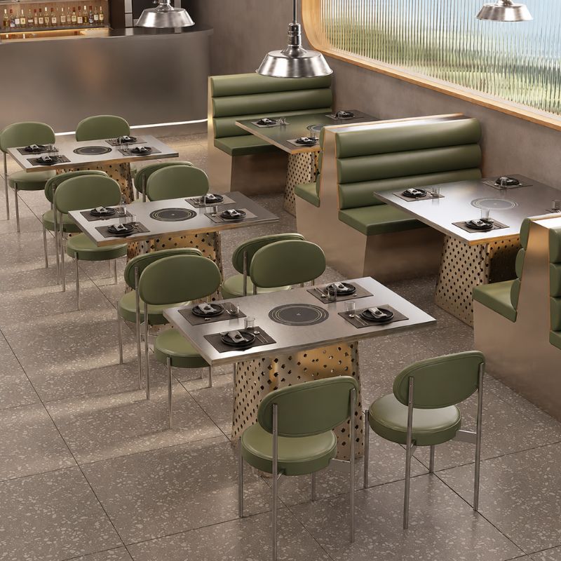 Custom hot pot table with booth seating and green restaurant chairs