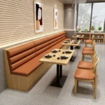Custom restaurant furniture with dining tables, chairs, and booth seating for commercial dining spaces